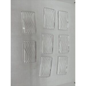 Crystal Lalique Leda knife rest with rectangular form, wave motif Set Of 8